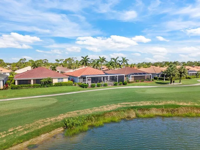 a aerial view of a house with a swimming pool