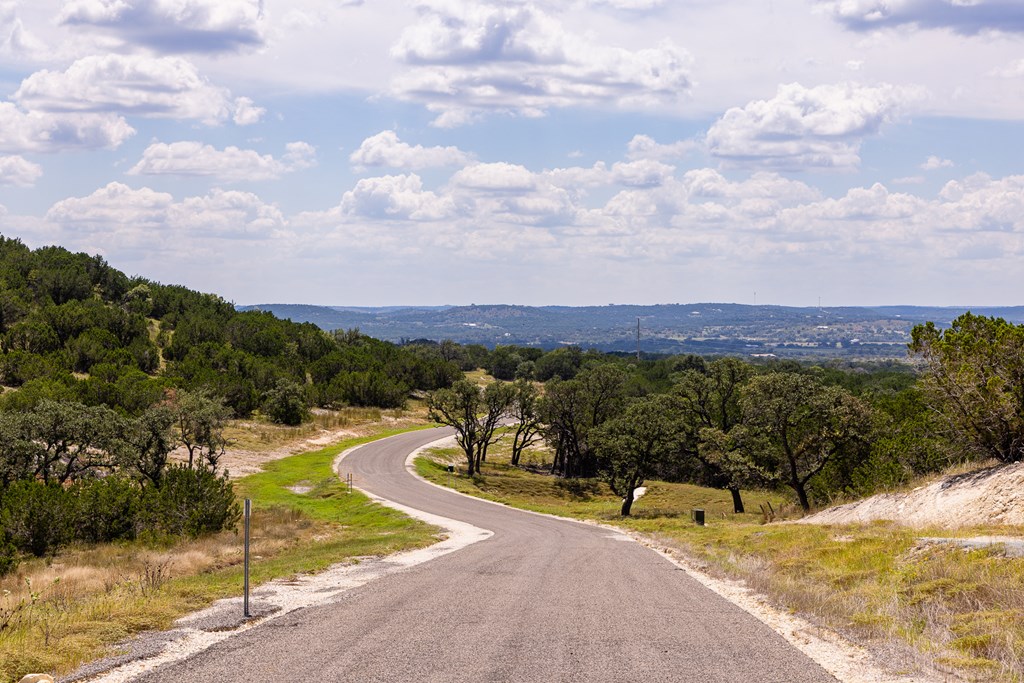 422 Dark Sky Path, Unit 9 Kerrville, TX 78028 - Photo 2 of 37 a view of a backyard of a house