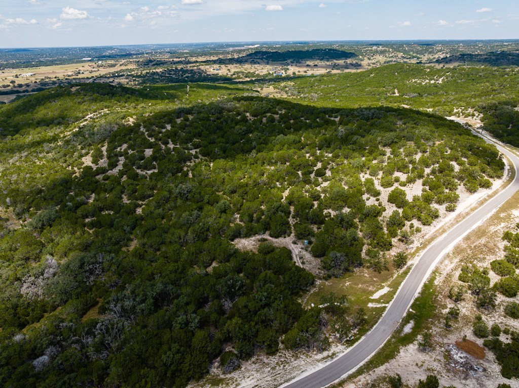 422 Dark Sky Path, Unit 9 Kerrville, TX 78028 - Photo 22 of 37 a view of a lake from a balcony