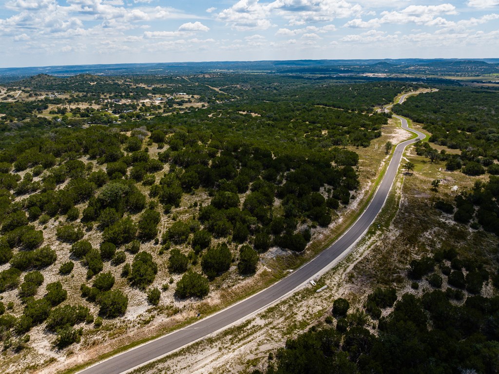 422 Dark Sky Path, Unit 9 Kerrville, TX 78028 - Photo 23 of 37 a view of a balcony with an outdoor space