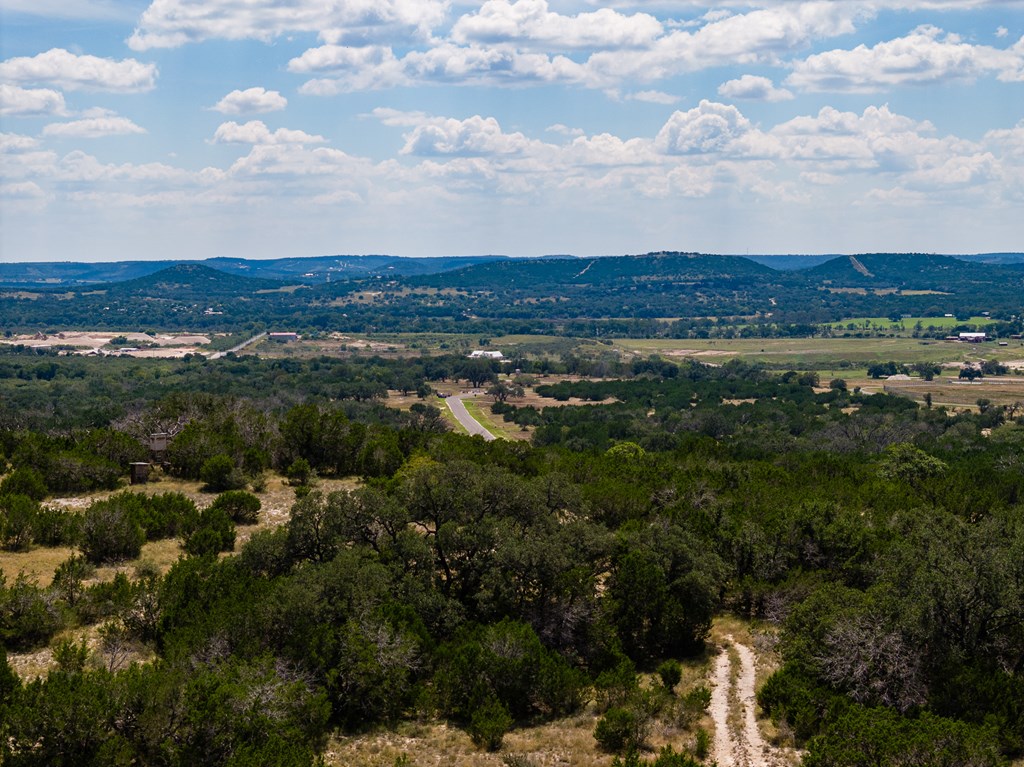 422 Dark Sky Path, Unit 9 Kerrville, TX 78028 - Photo 24 of 37 a view of a city with mountains in the background
