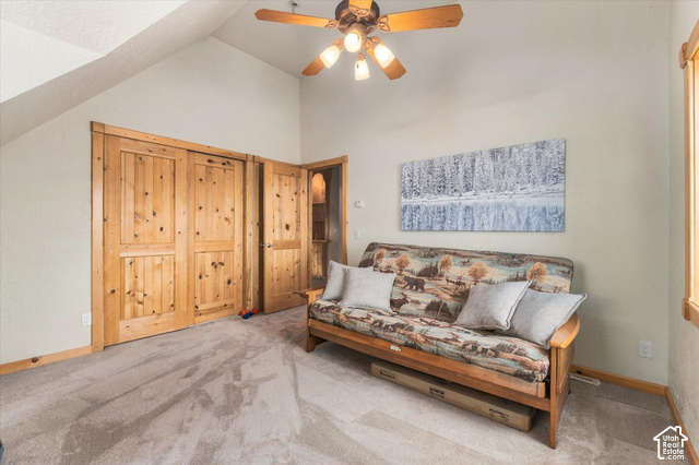 1701 Oak Road Coalville, UT 84017 - Photo 48 of 71 Vaulted ceiling with a ceiling fan, carpet flooring, natural wood doors, and natural wood window trim