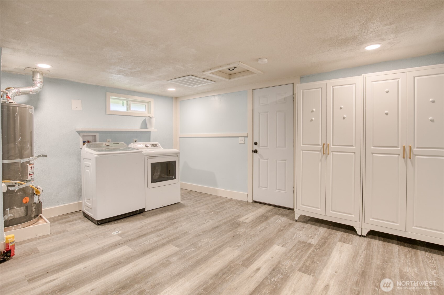 1319 West 2nd Street Aberdeen, WA 98520 - Photo 11 of 25 a view of a kitchen with a sink and dishwasher
