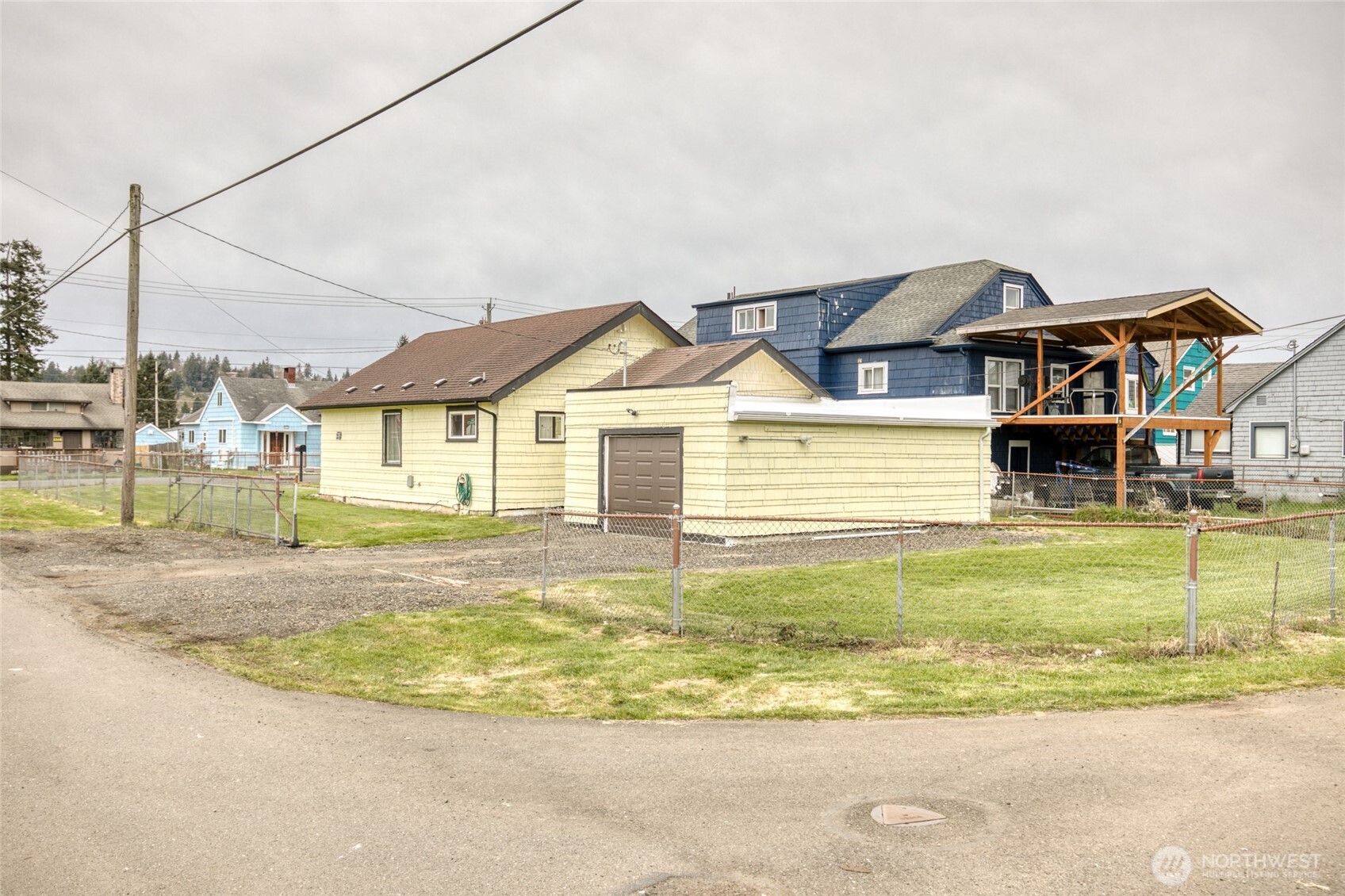 1319 West 2nd Street Aberdeen, WA 98520 - Photo 5 of 25 a view of a house with a swimming pool