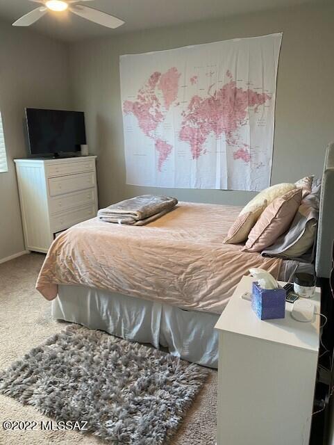 866 East Millenium Court Tucson, AZ 85719 - Photo 13 of 15 a bedroom with a bed and furniture