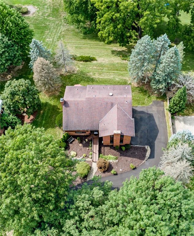 104 Yorktown Road Canonsburg, PA 15317 - Photo 2 of 25 Nestled in the privacy of mature landscaping, the half acre lot has nice usability!