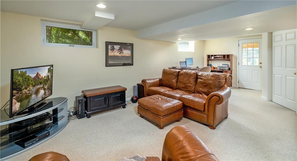 104 Yorktown Road Canonsburg, PA 15317 - Photo 18 of 25 The current owner has an in-home office in the lower level...with walk-out access to the rear yard patio...