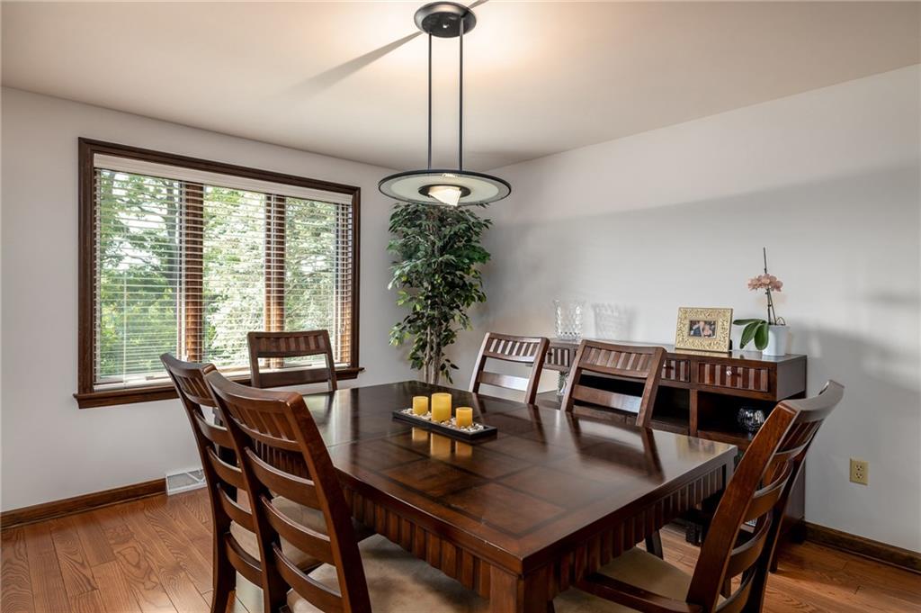 104 Yorktown Road Canonsburg, PA 15317 - Photo 8 of 25 The dining room is open from the living room, creating an nice open flow when entertaining! Hardwood flooring is continued through the dining room...