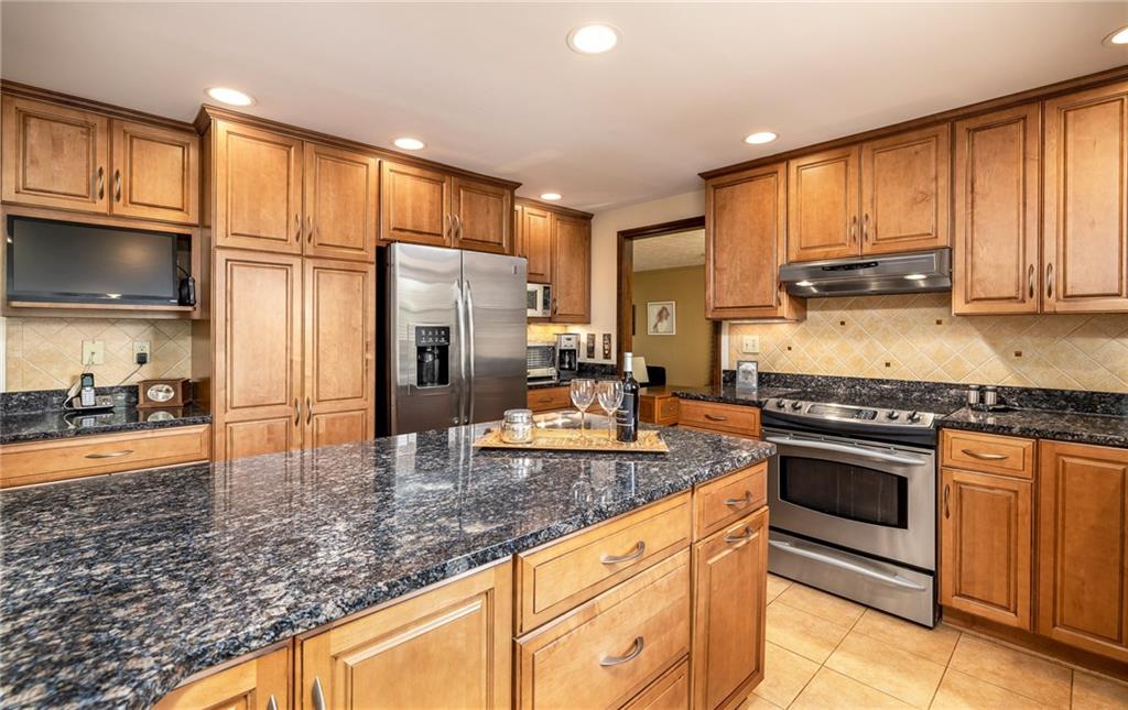 104 Yorktown Road Canonsburg, PA 15317 - Photo 10 of 25 The kitchen offers abundant glazed maple cabinetry and granite counter top space!