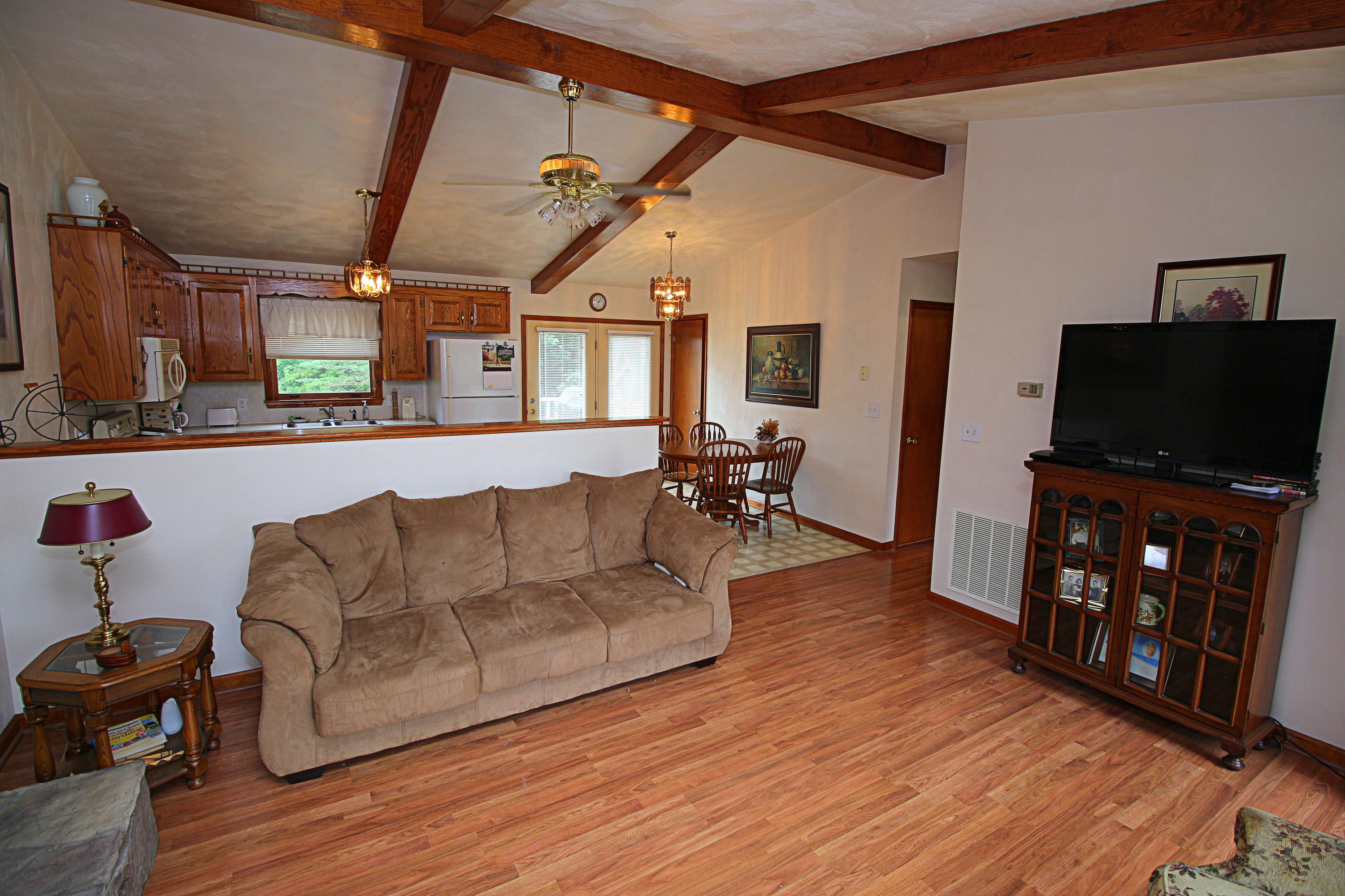 2785 Quarles Road Thaxton, VA 24174 - Photo 4 of 37 a living room with furniture and a flat screen tv