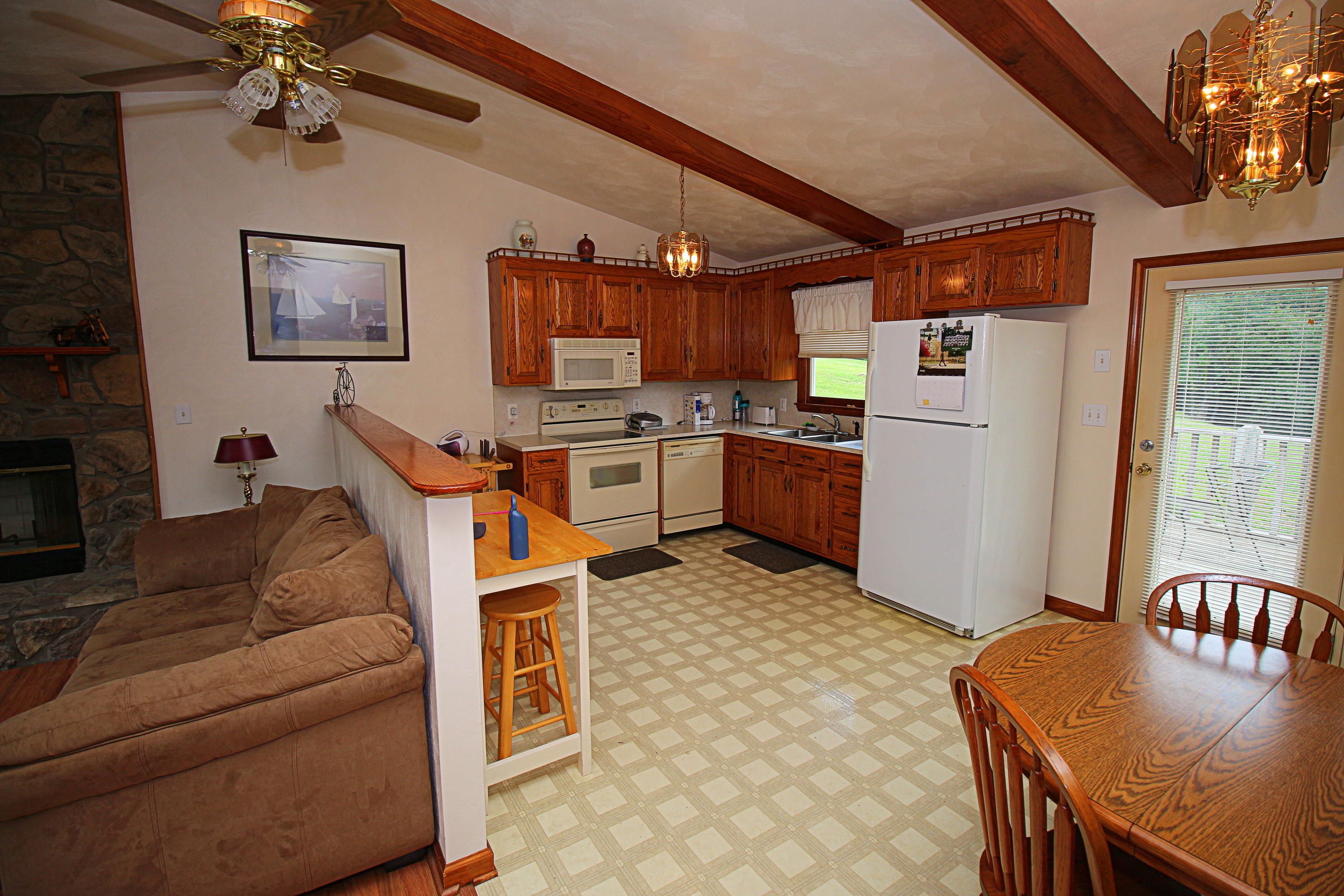 2785 Quarles Road Thaxton, VA 24174 - Photo 5 of 37 a living room with stainless steel appliances granite countertop furniture and a kitchen view