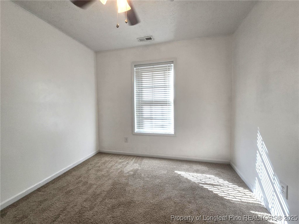 1540 Clan Campbell Drive Raeford, NC 28376 - Photo 29 of 35 an empty room with a window