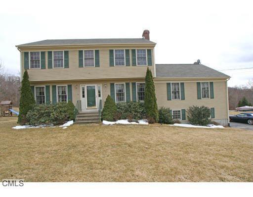 6 Summit Ridge Road Shelton, CT 06484 - Photo 1 of 1 a front view of a house with a yard