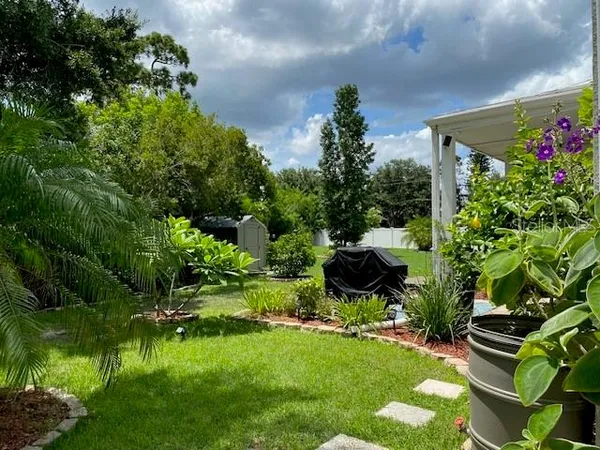 a bathroom with a shower and a sink