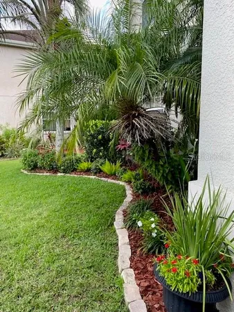 a view of a garden with a fountain