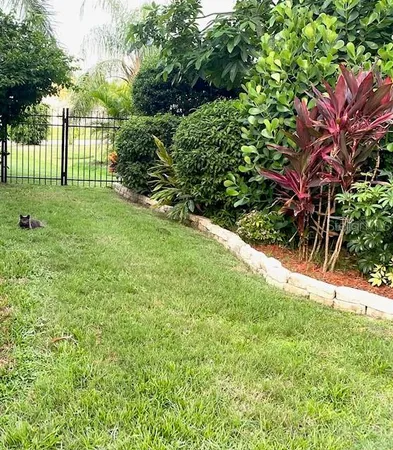 a view of a hallway to a livingroom and a hallway