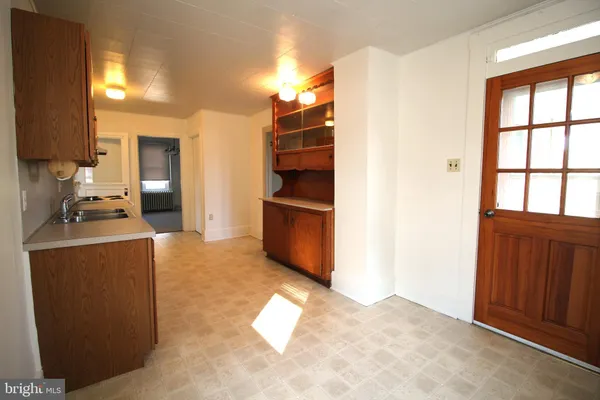 a view of kitchen and windows