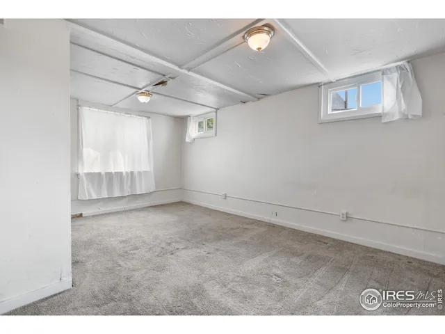 an aerial view of residential building and ocean view
