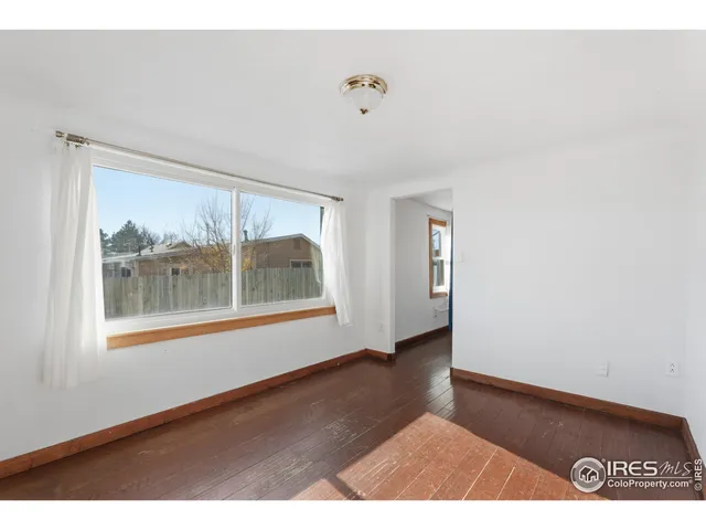 a kitchen with a refrigerator a sink and a stove