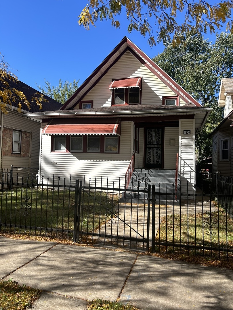 a front view of a house with a balcony