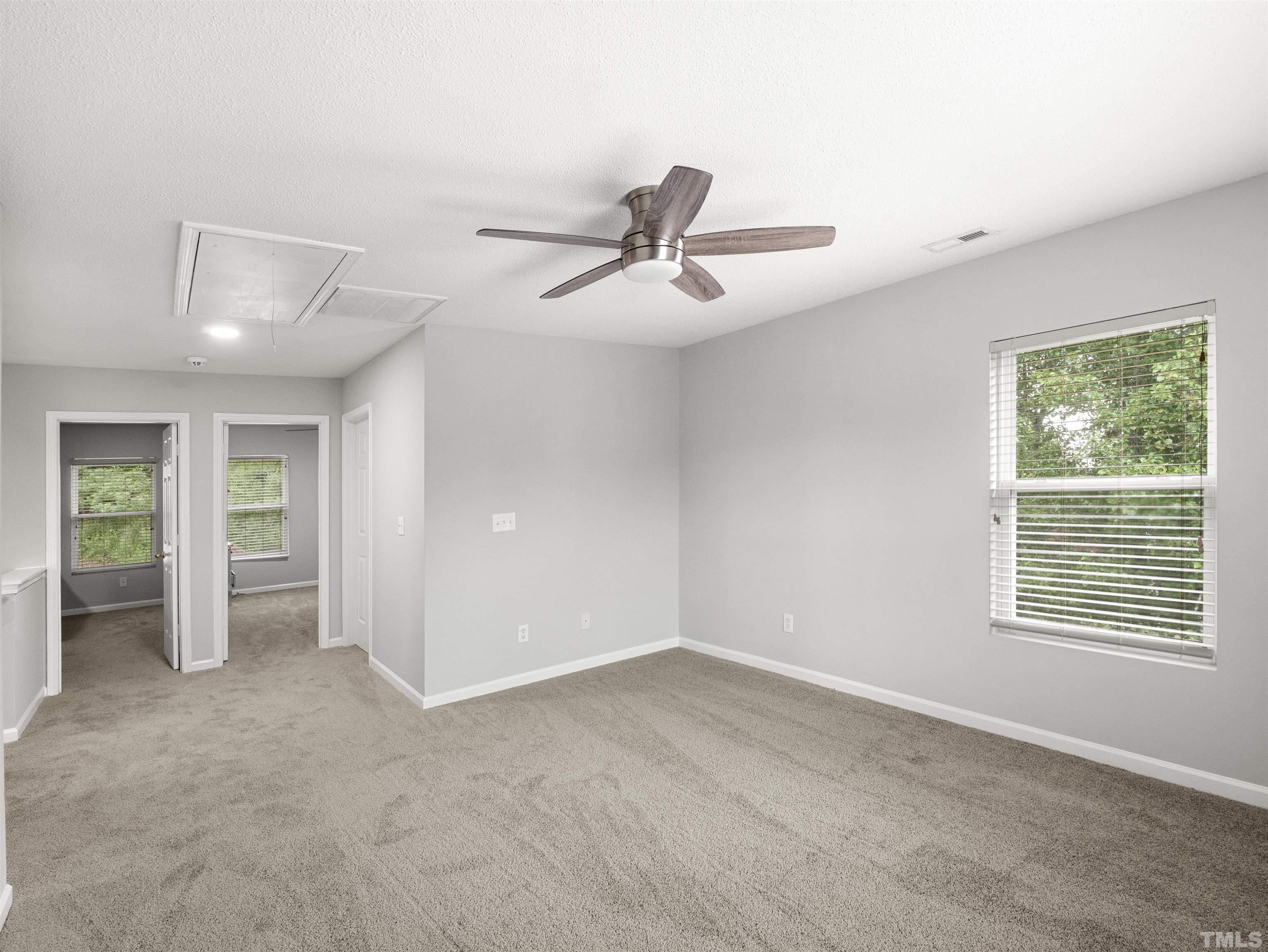 4 Red Spring Court Durham, NC 27703 - Photo 19 of 35 a view of an empty room with a window
