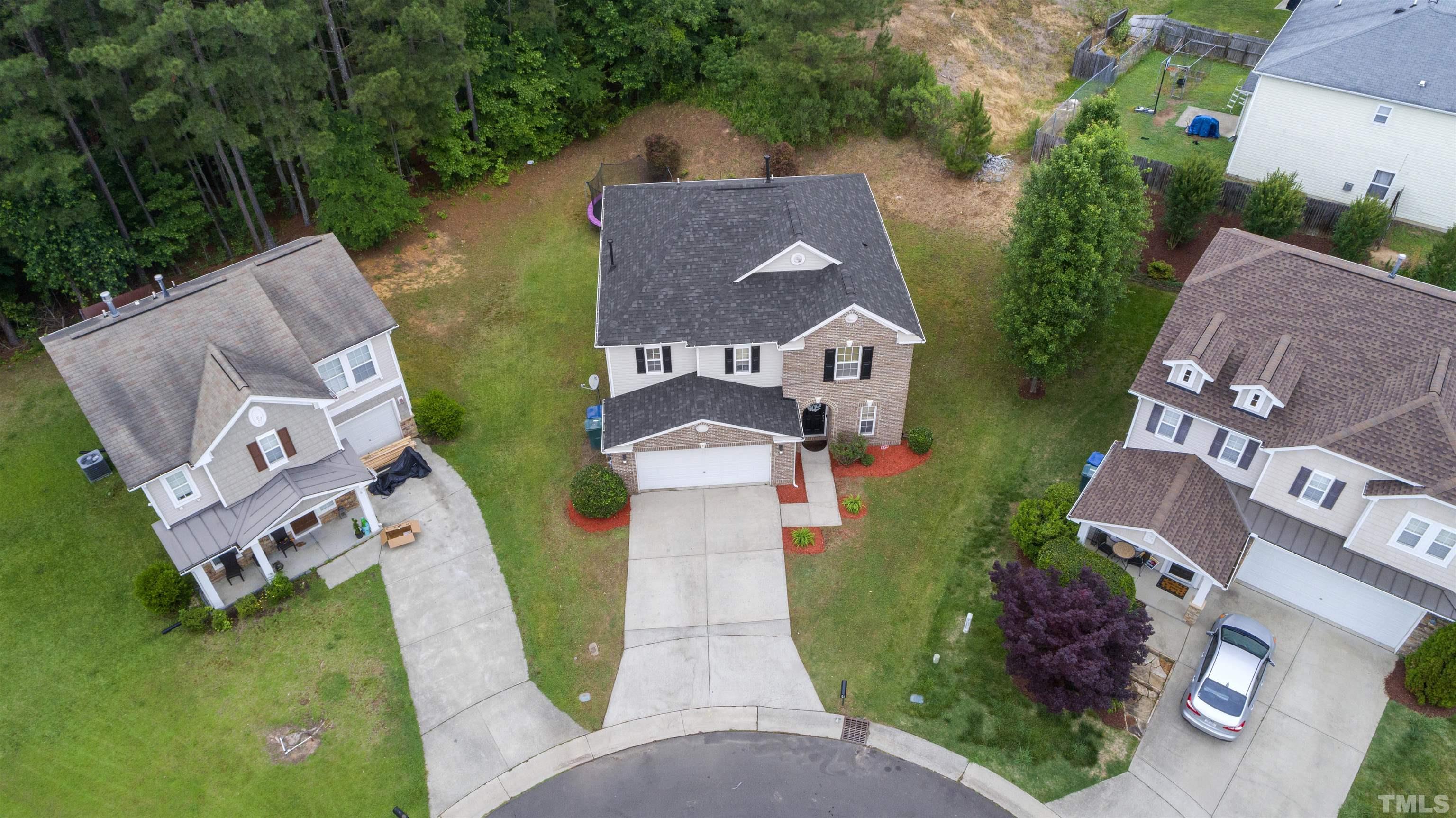4 Red Spring Court Durham, NC 27703 - Photo 32 of 35 an aerial view of a house with outdoor space pool patio seating area and yard