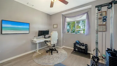 a view of a workspace with gym equipment