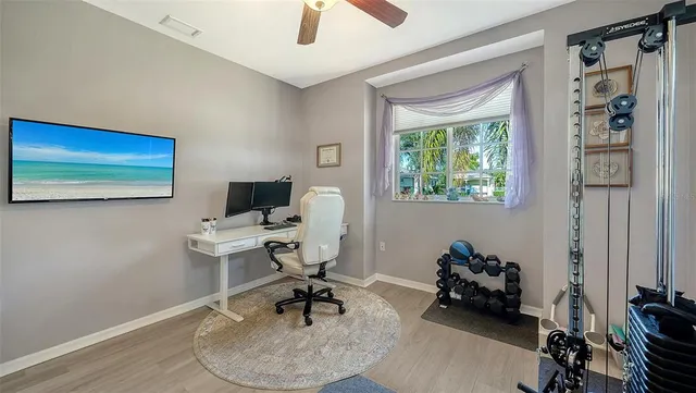 a view of a workspace with gym equipment