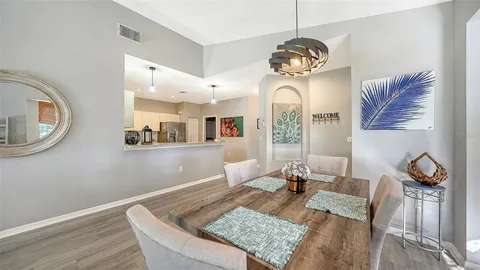 a living room with granite countertop furniture and a window