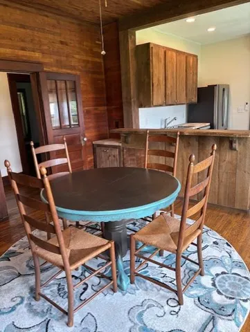 a view of a dining room with furniture