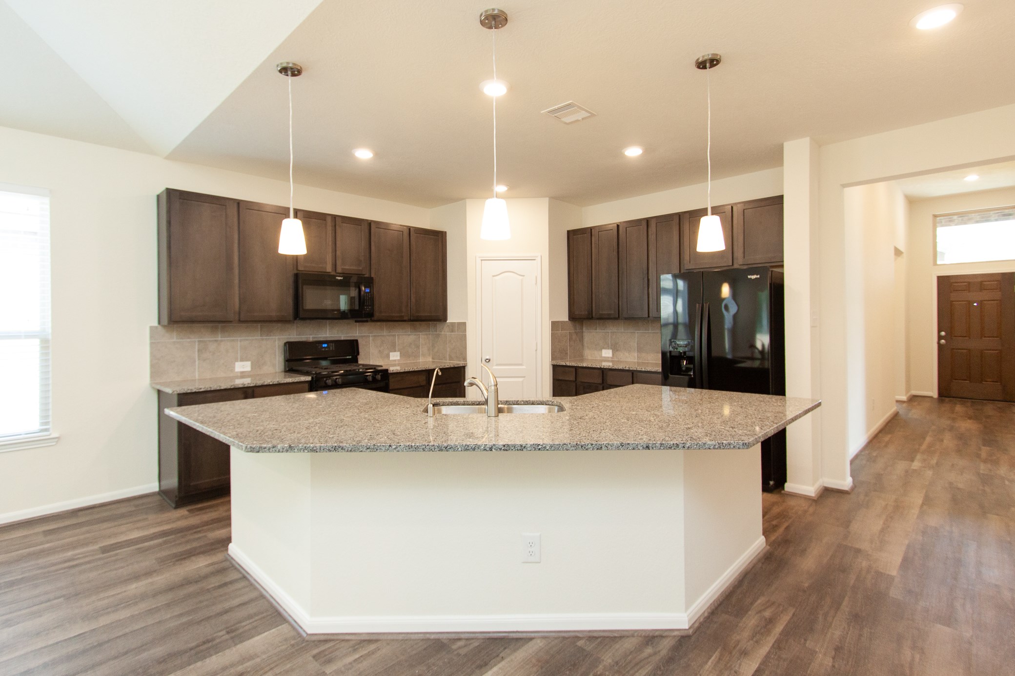 2011 Parnevik Place Conroe, TX 77304 - Photo 20 of 37 Your kitchen is very spacious and has all brand new Whirlpool appliances.
