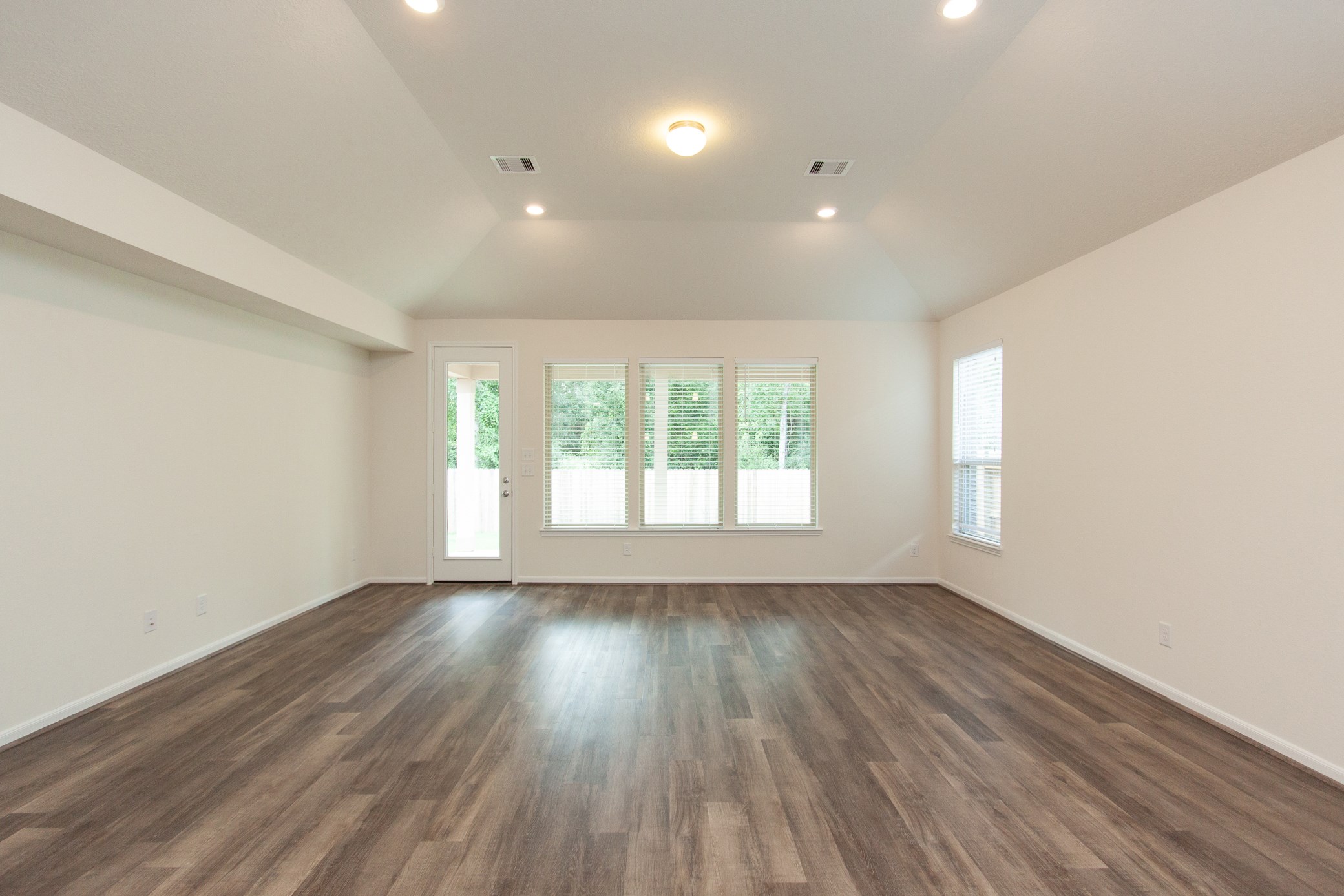 2011 Parnevik Place Conroe, TX 77304 - Photo 23 of 37 Another view of the very large living space. Overlooking the backyard.