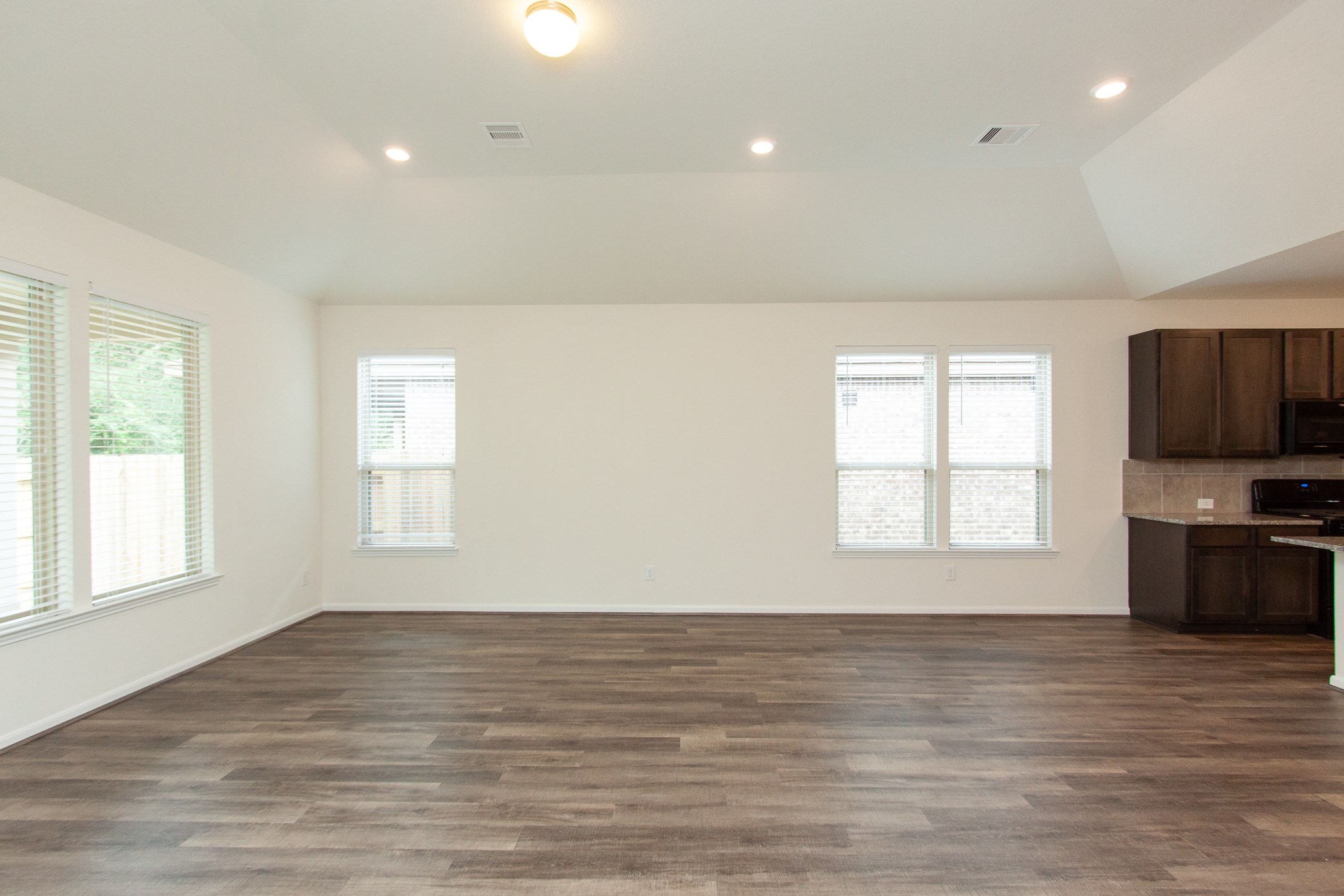 2011 Parnevik Place Conroe, TX 77304 - Photo 24 of 37 Another view of the living room with can lighting.