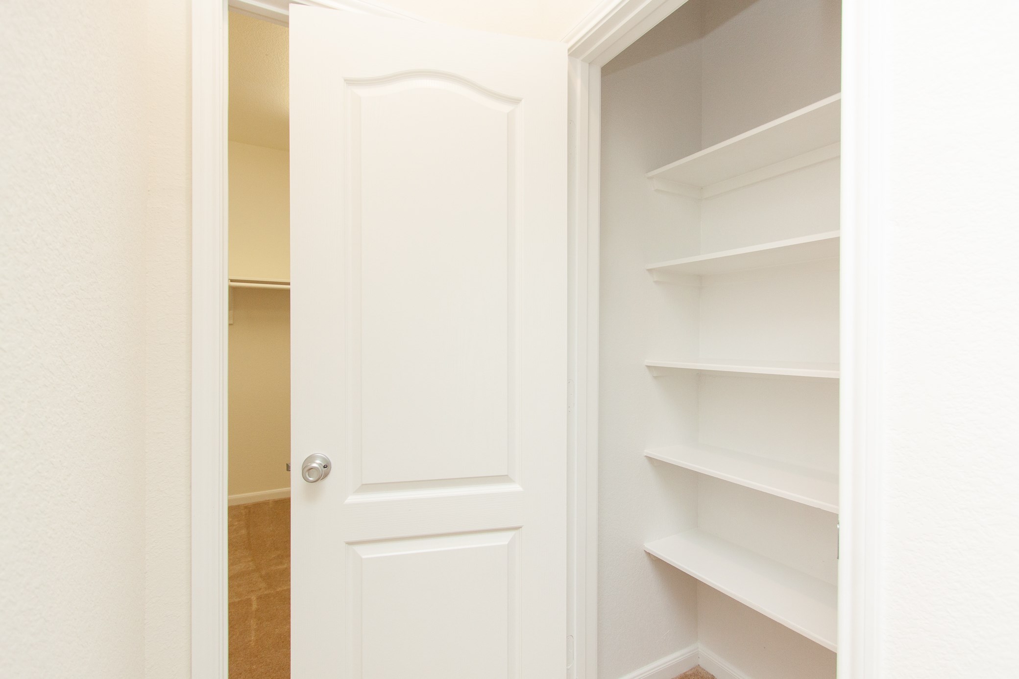 2011 Parnevik Place Conroe, TX 77304 - Photo 29 of 37 Here's the linens closet that could also be a shoe closet.