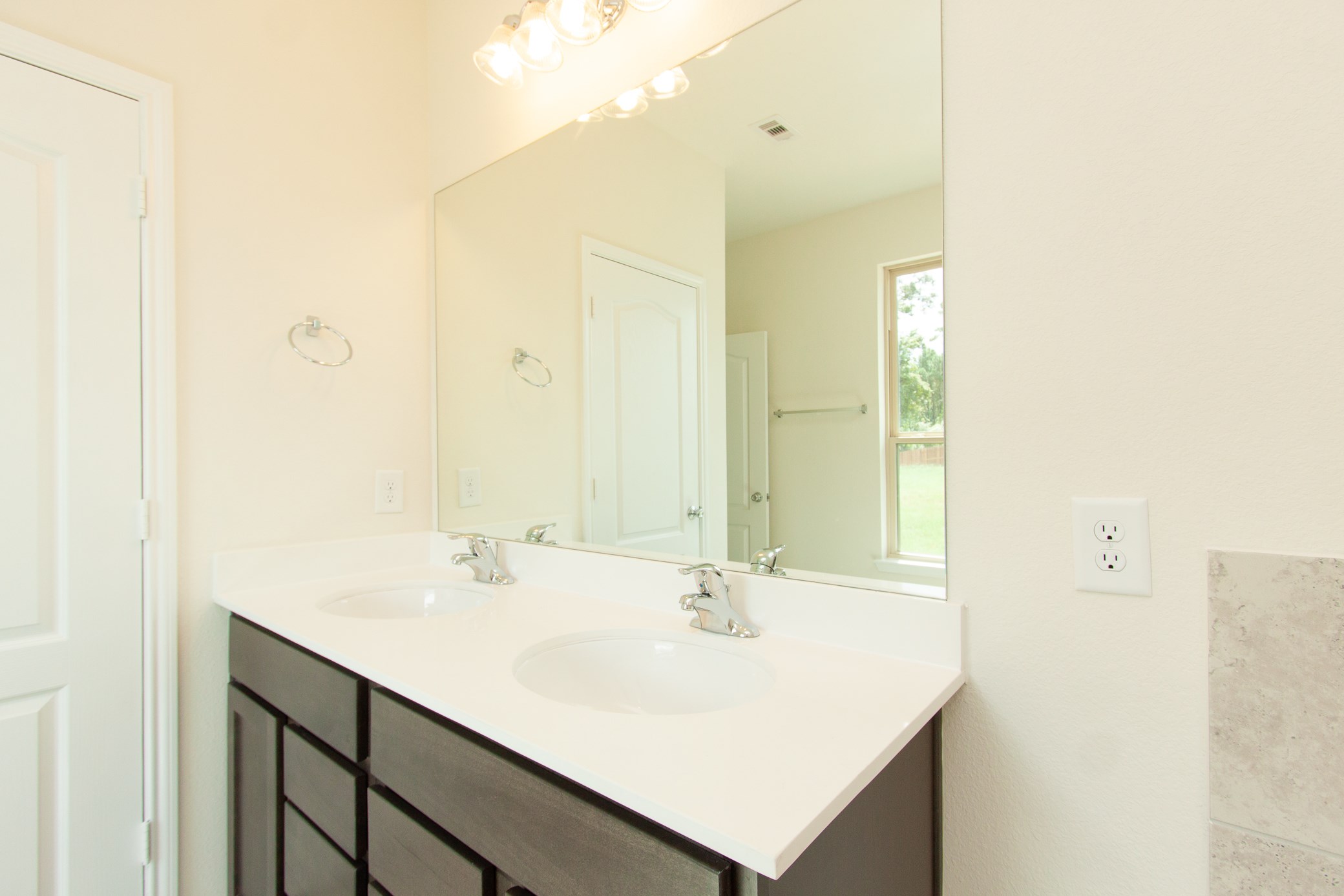 2011 Parnevik Place Conroe, TX 77304 - Photo 30 of 37 Here's the Primary bathroom, with a double sink.