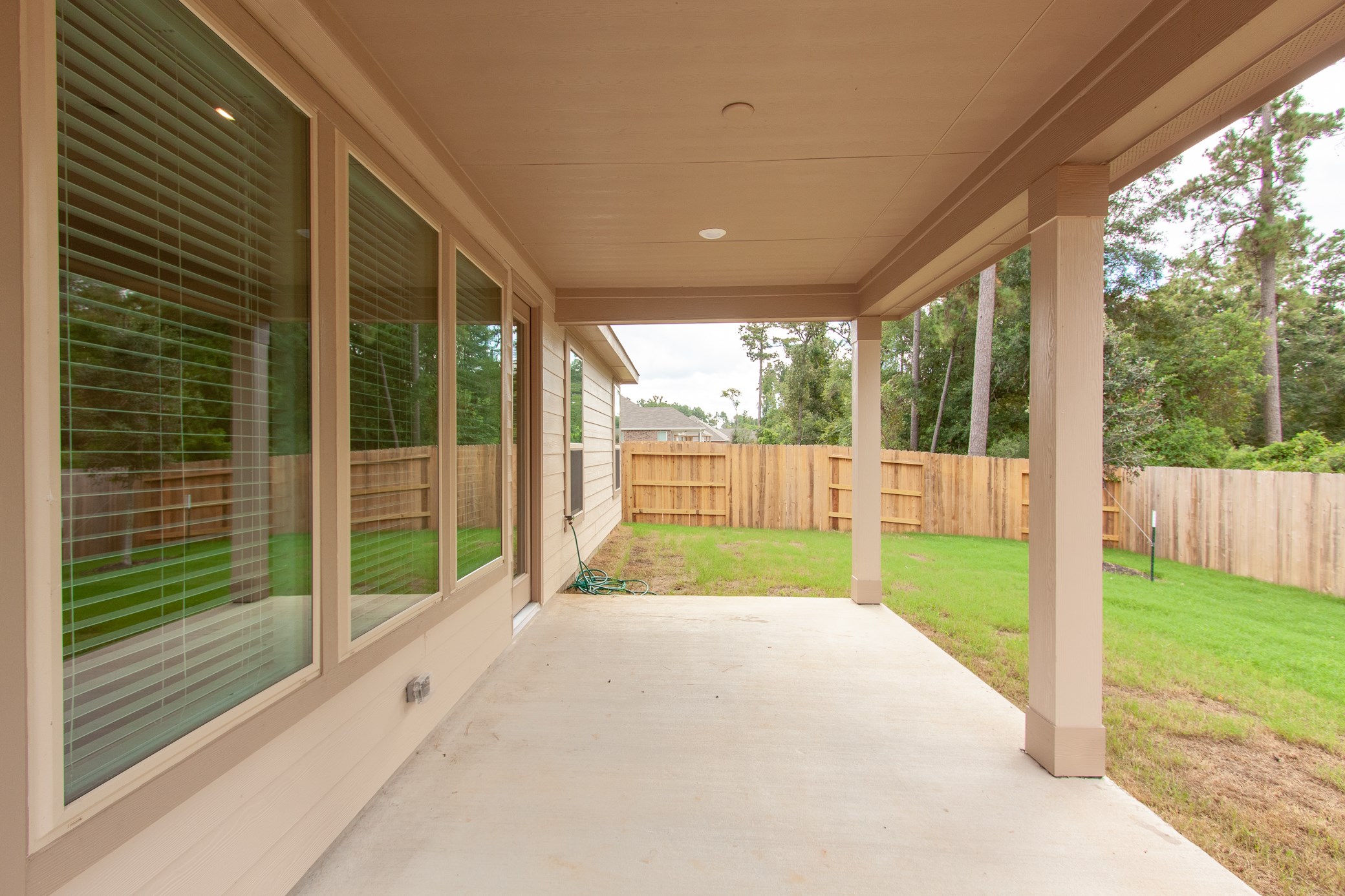 2011 Parnevik Place Conroe, TX 77304 - Photo 35 of 37 The backyard patio is 19X10. Completely covered.
