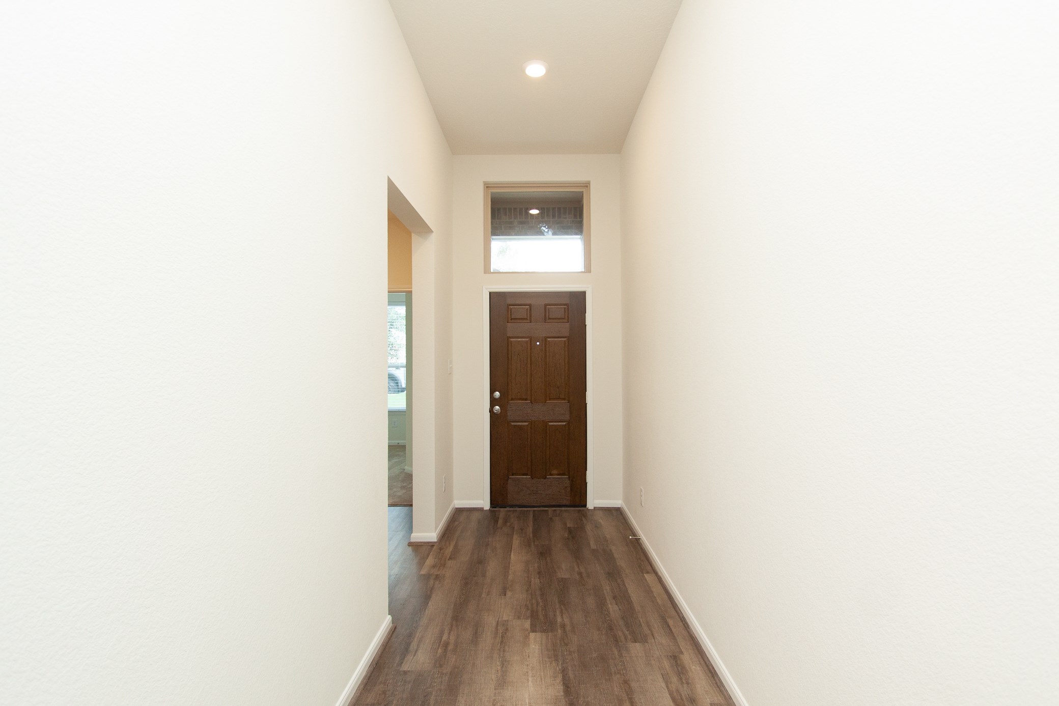 2011 Parnevik Place Conroe, TX 77304 - Photo 4 of 37 This is the view of the front door. As you can see, the home has high ceilings.