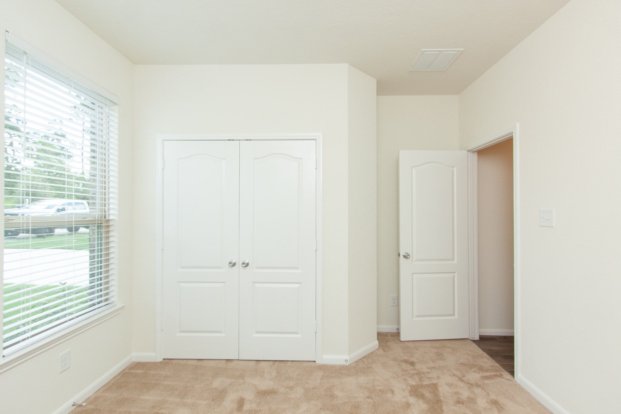 2011 Parnevik Place Conroe, TX 77304 - Photo 8 of 37 This bedroom looks out to the street and front of the property. This room is 11X12FT.