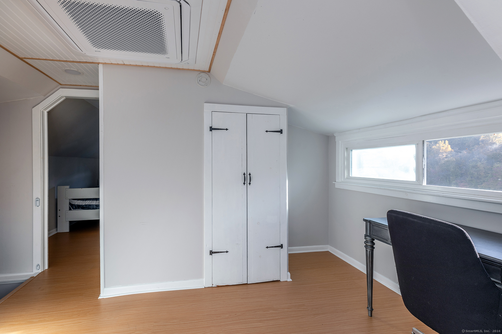 5 Windmill Road New Fairfield, CT 06812 - Photo 22 of 37 a view of a livingroom with furniture and window