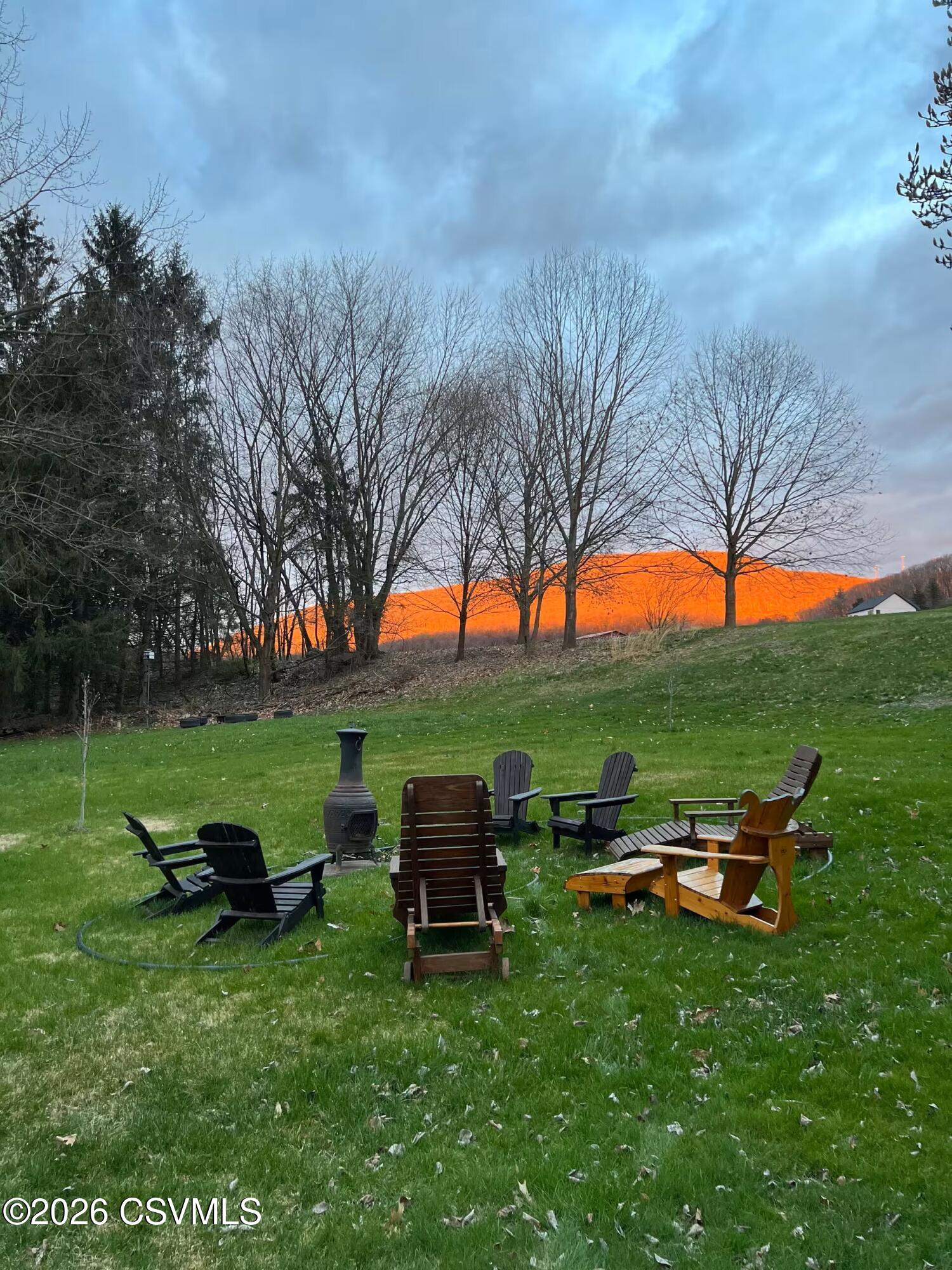44 Mountain Road Catawissa, PA 17820 - Photo 19 of 21 a backyard of a house with table and chairs