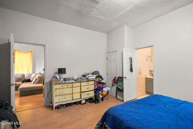 a room with furniture and wooden floor