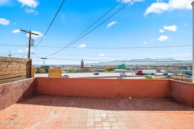 a view of a house with wooden roof