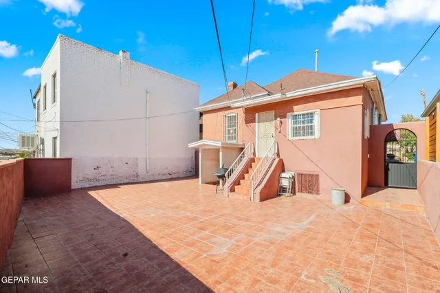 a kitchen with stainless steel appliances granite countertop a stove and a sink