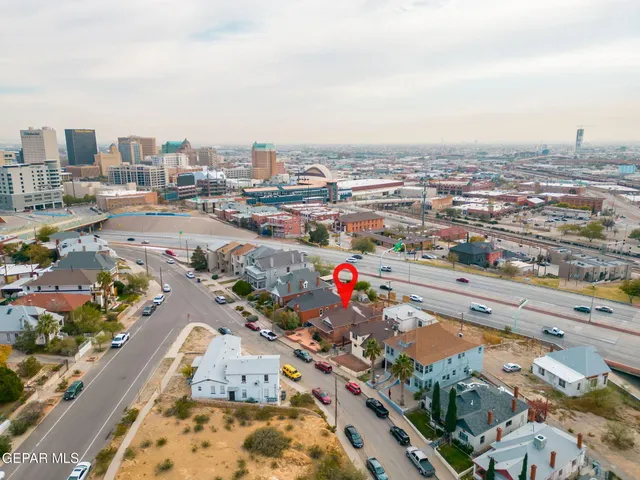 an aerial view of city and lake