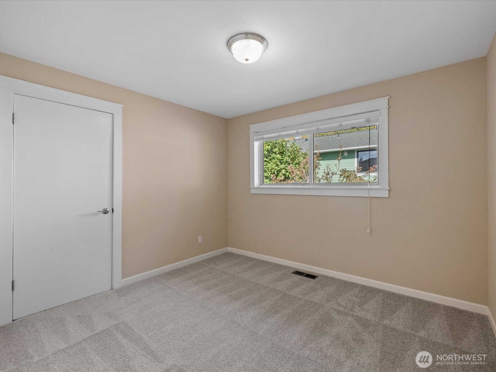 19116 106th Avenue Northeast Bothell, WA 98011 - Photo 16 of 40 an empty room with a window