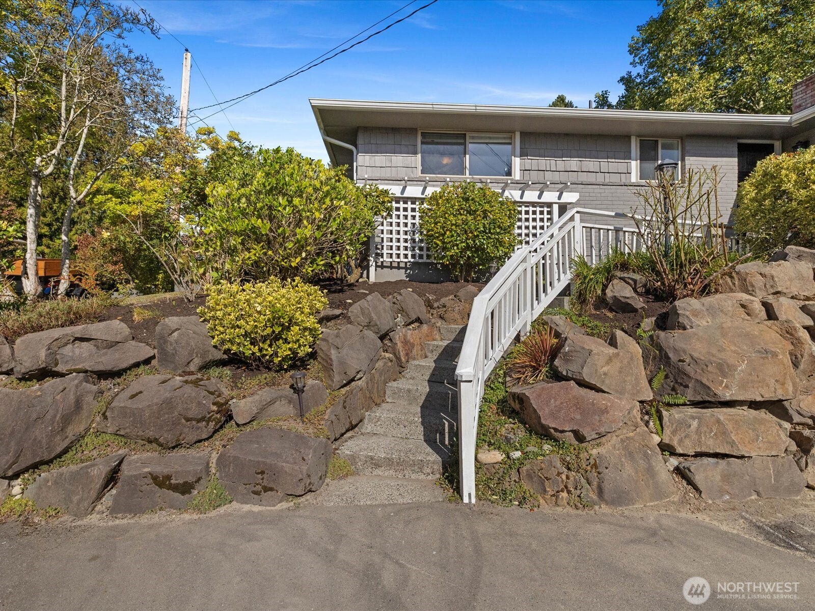 19116 106th Avenue Northeast Bothell, WA 98011 - Photo 2 of 40 front view of house with a yard