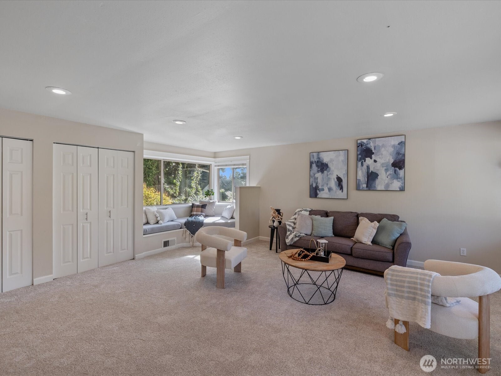 19116 106th Avenue Northeast Bothell, WA 98011 - Photo 28 of 40 a living room with furniture and a large window