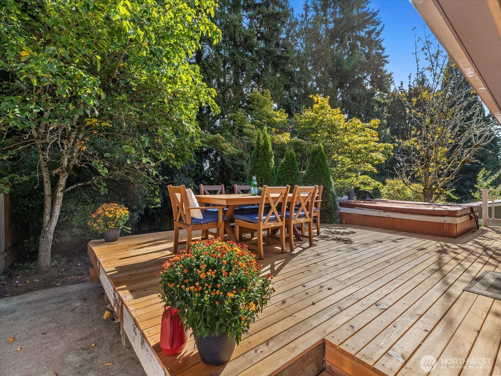 19116 106th Avenue Northeast Bothell, WA 98011 - Photo 29 of 40 a view of a chairs and tables on the wooden roof deck