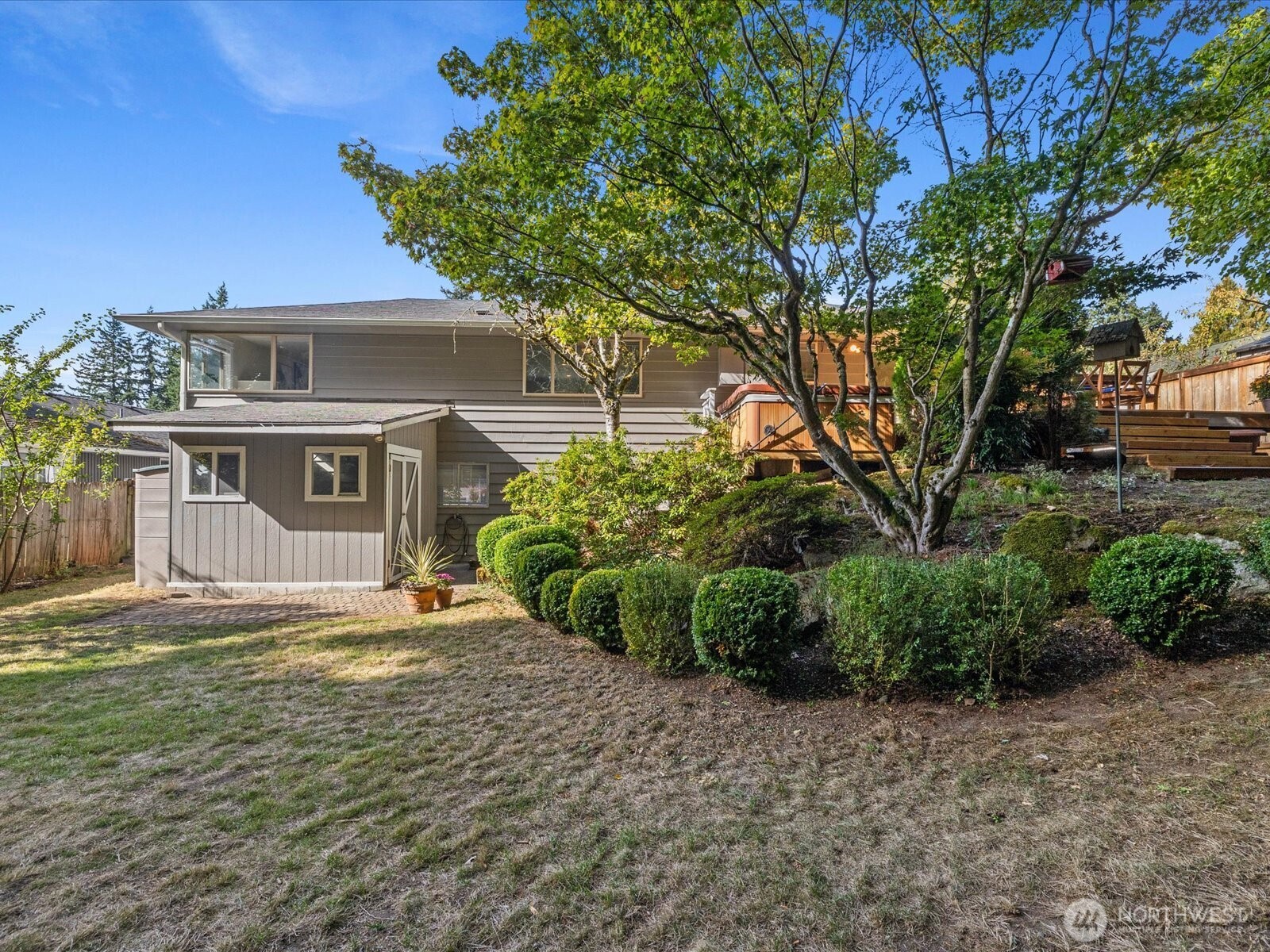 19116 106th Avenue Northeast Bothell, WA 98011 - Photo 33 of 40 a front view of a house with a yard