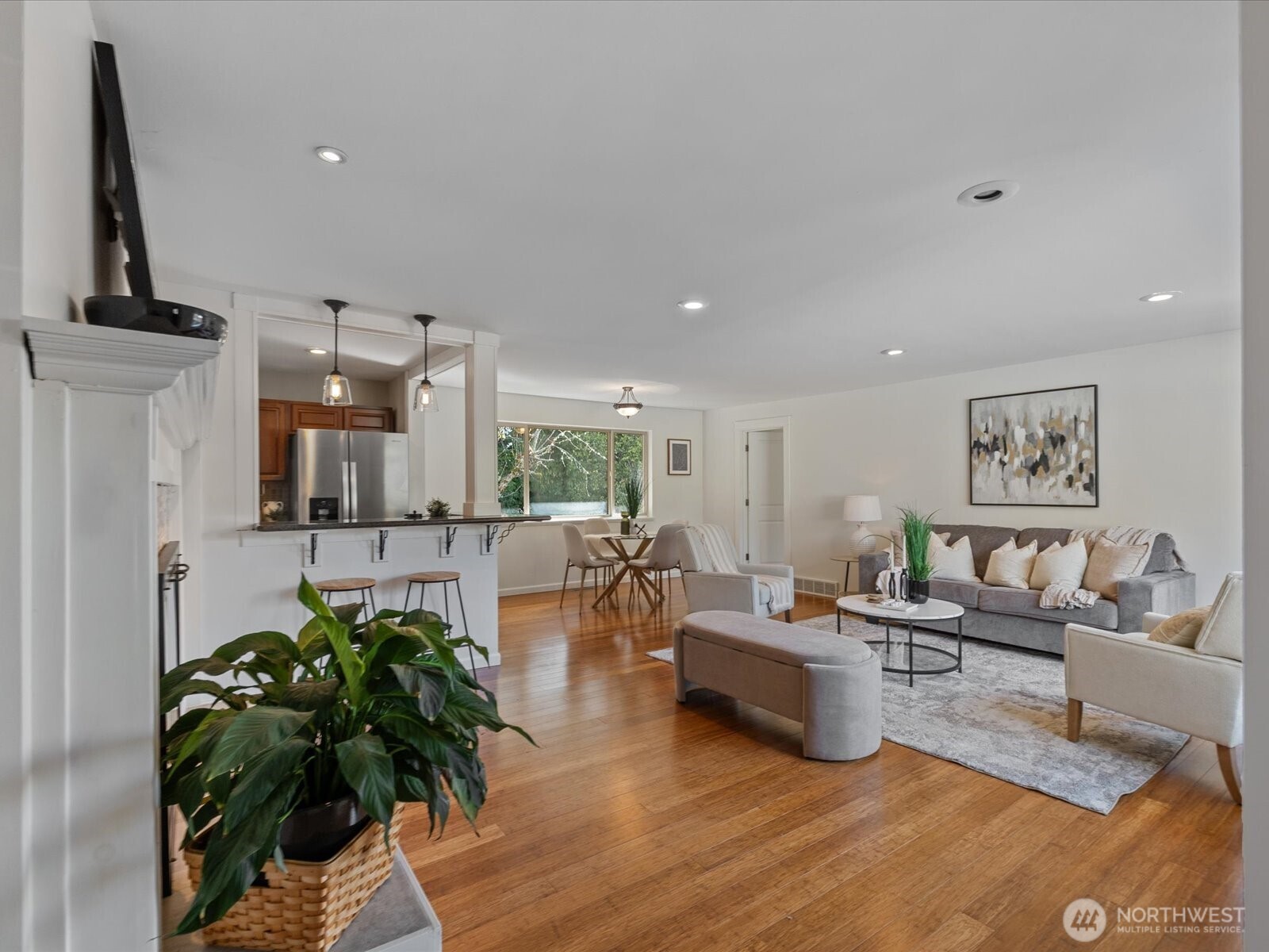 19116 106th Avenue Northeast Bothell, WA 98011 - Photo 5 of 40 a living room with furniture and a potted plant